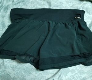 Black athletic shorts with black mesh detail